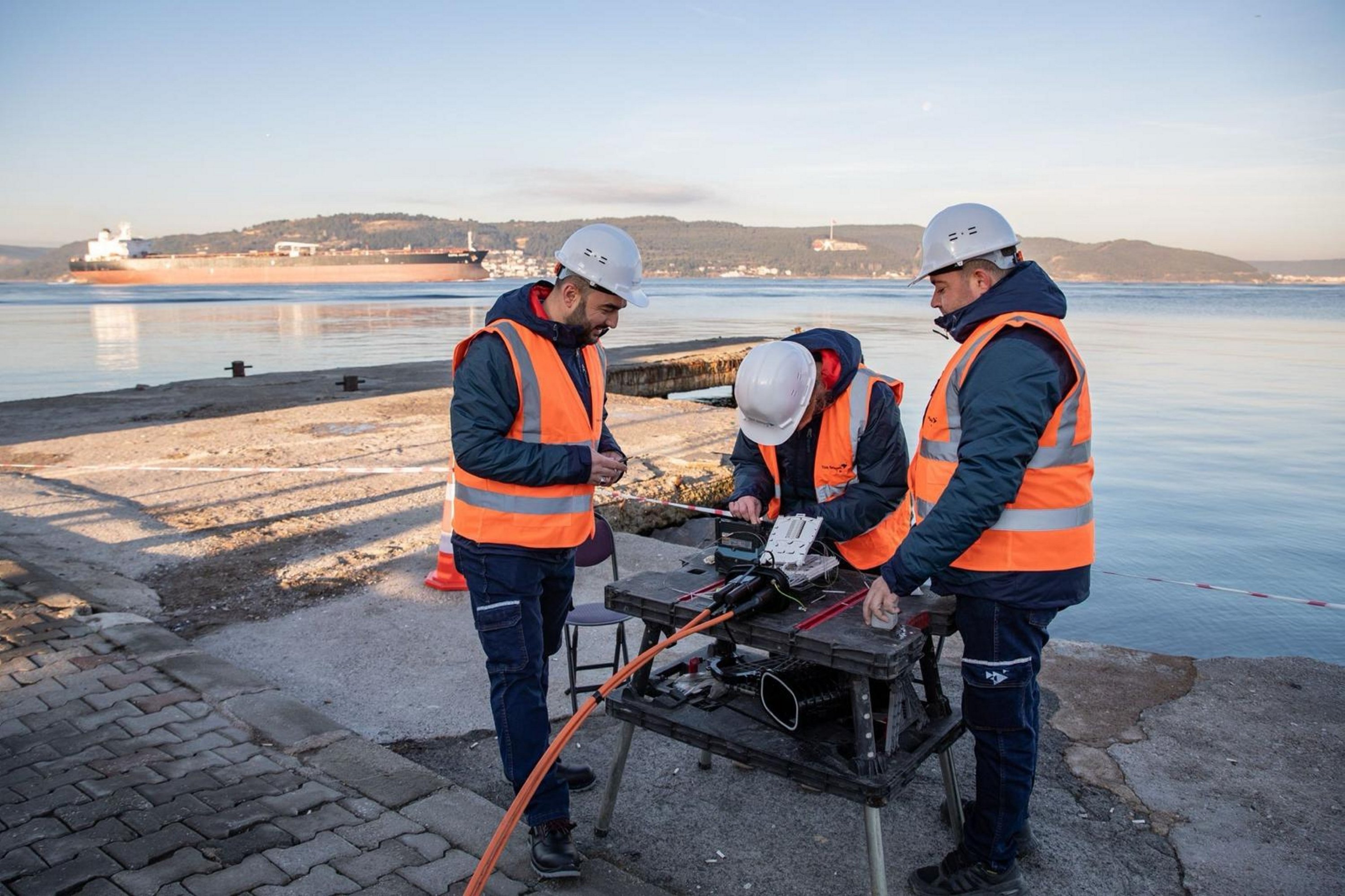320808 Türk Telekom engineers work a fiber infrastructure in an unspecified location. (Courtesy of Türk Telekom)