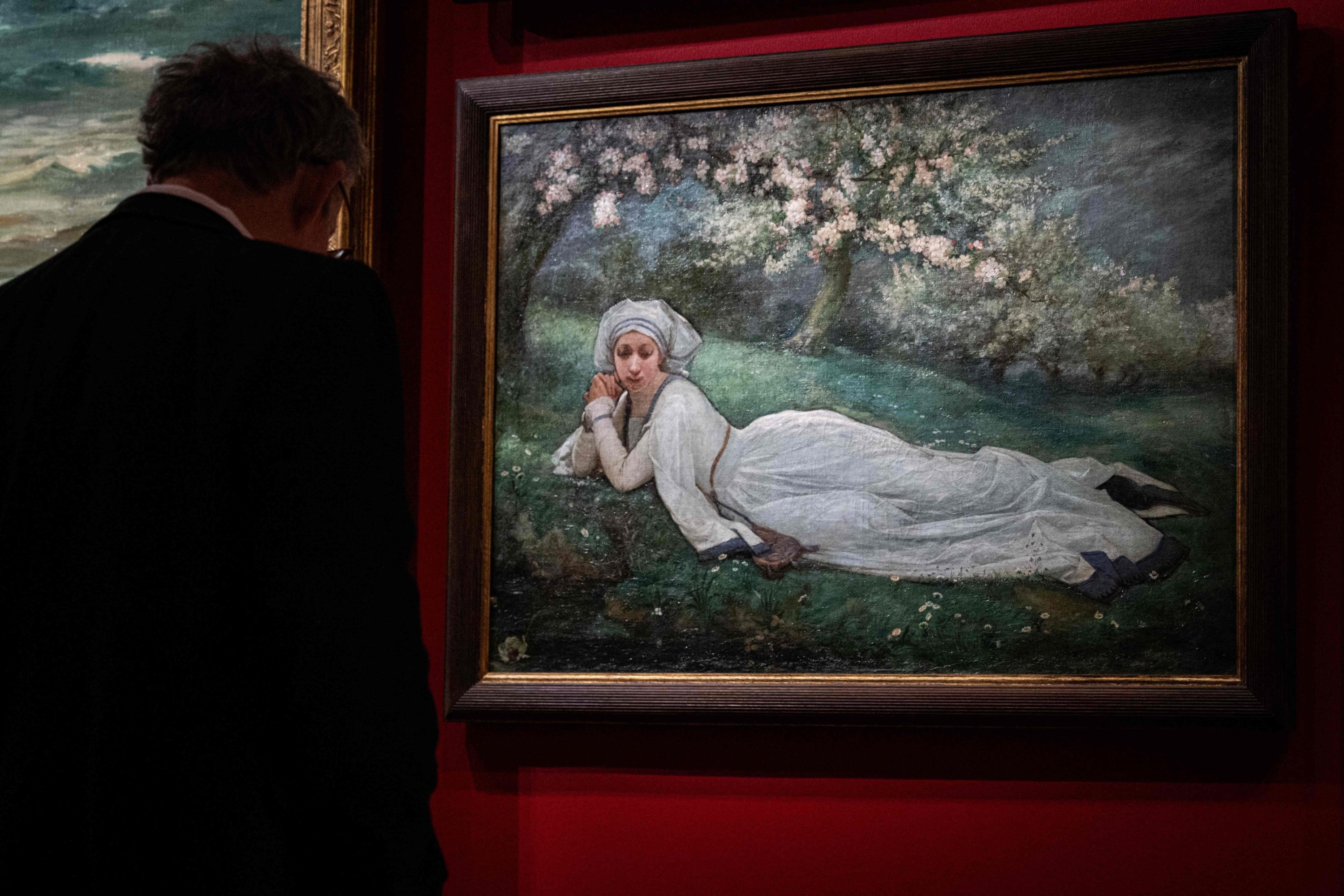 320837 A visitor looks at the painting entitled
