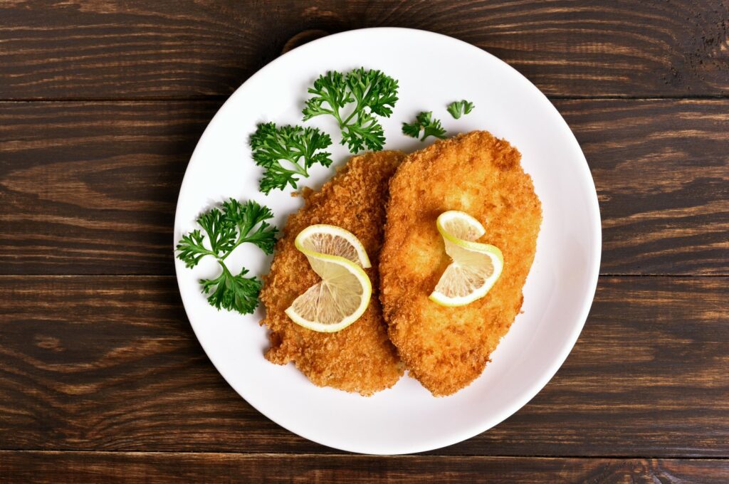 Chicken Schnitzel, German culinary delight, boasts a rich heritage steeped in traditional German cuisine. (Shutterstock Photo)