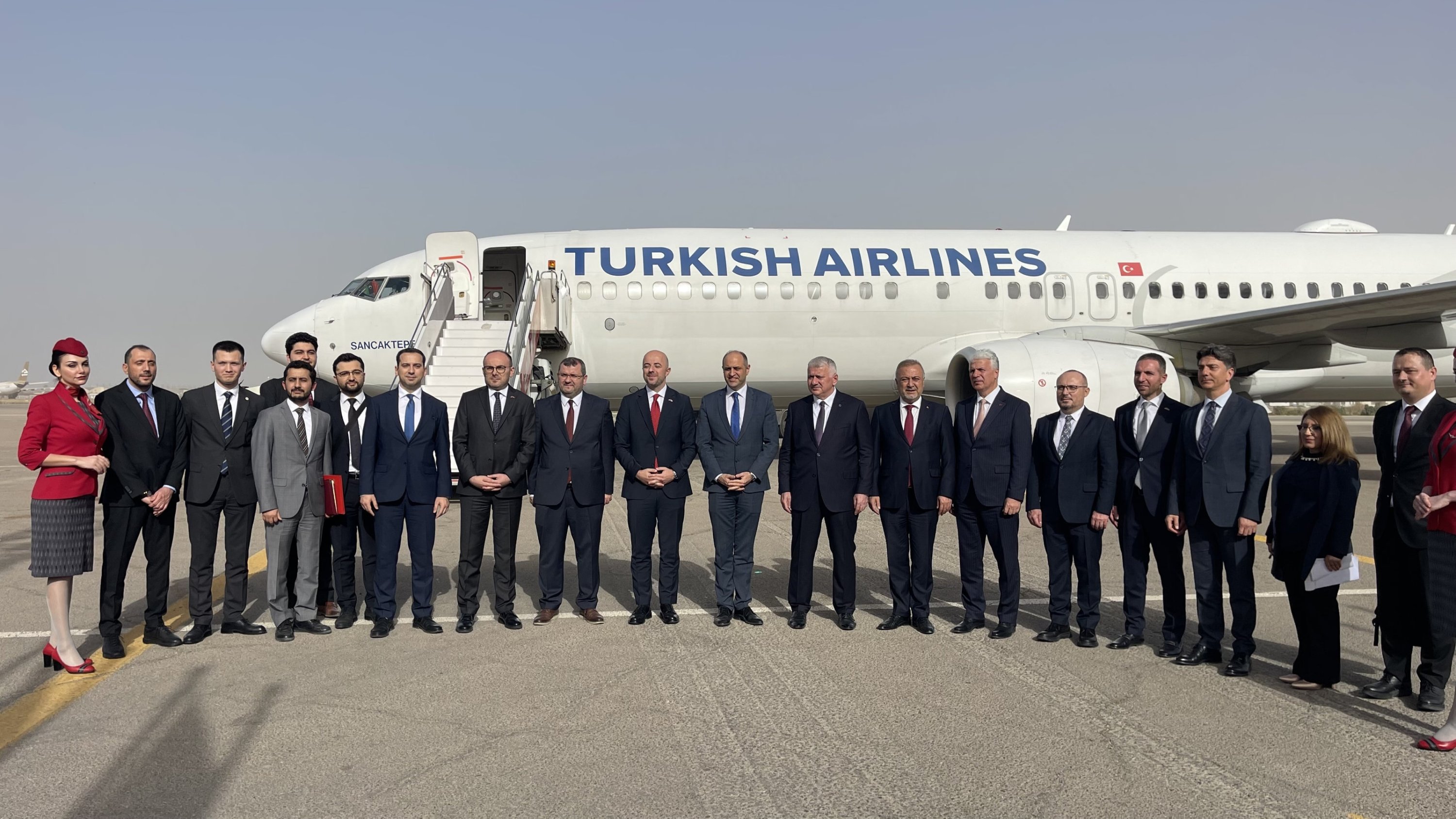 321695 Officials pose for a photo at the Mitiga International Airport to mark Turkish Airlines' resumption of flights to Libya, March 28, 2024. (AA Photo)