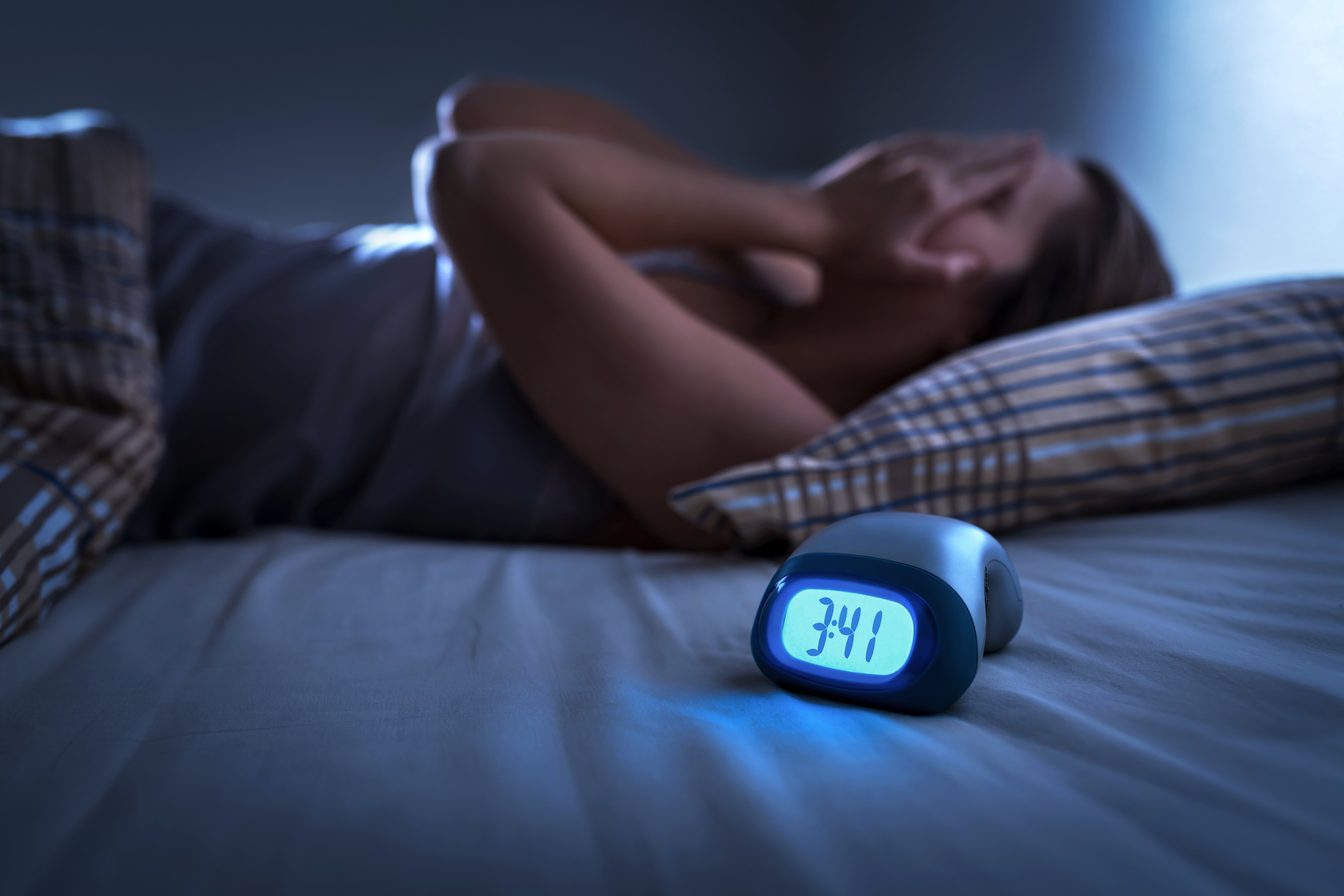 It's important to stick to a consistent sleep schedule to regulate your body's internal clock. (Shutterstock Photo)