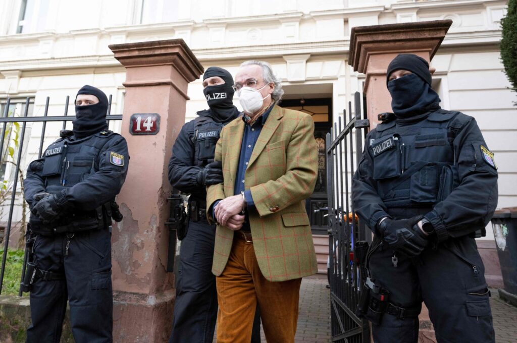 German police special forces detain Heinrich XIII Prinz Reuss after searching a house, Frankfurt am Main, Germany, Dec. 7, 2022. (AFP Photo)