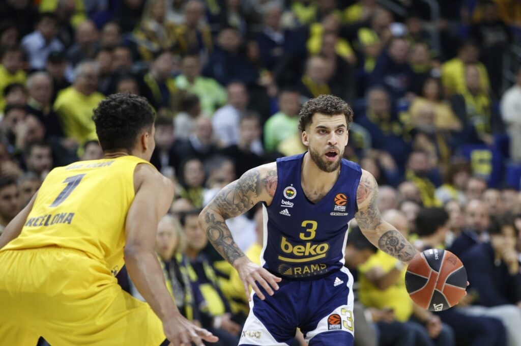 Fenerbahçe Beko's Scottie Wilbekin (R) in action during the match against Barcelona, Barcelona, Spain, March 20, 2024. (IHA Photo)
