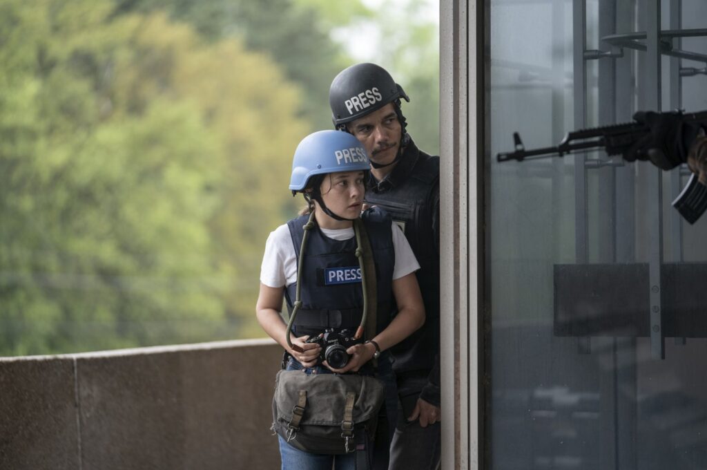 This image released by A24 shows Cailee Spaeny (L) and Wagner Moura in a scene from "Civil War." (AP Photo)