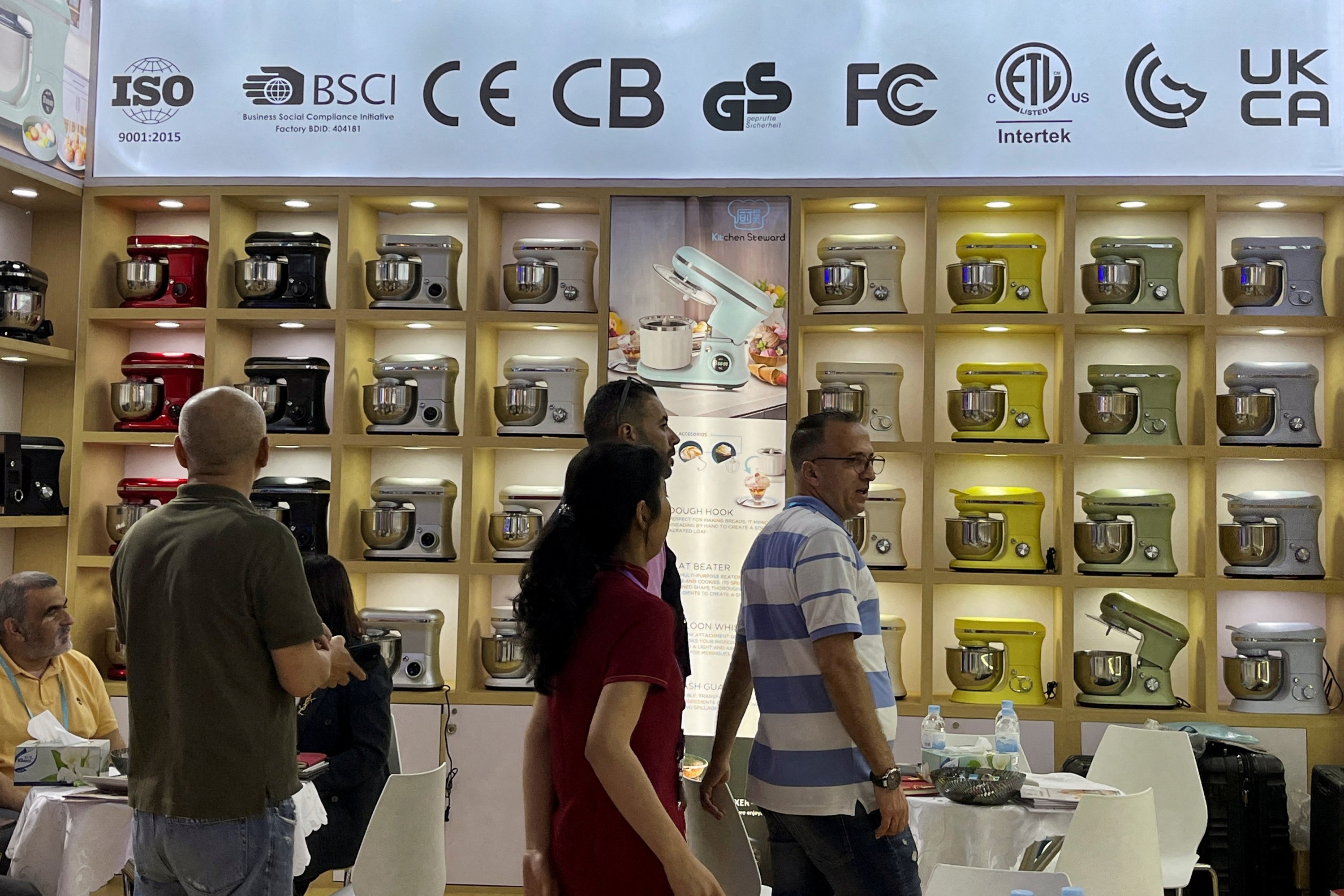 323975 People stand next to stand mixers displayed at a kitchen equipment booth at the China Import and Export Fair, also known as Canton Fair, in Guangzhou, Guangdong province, China, April 15, 2024. (Reuters Photo)