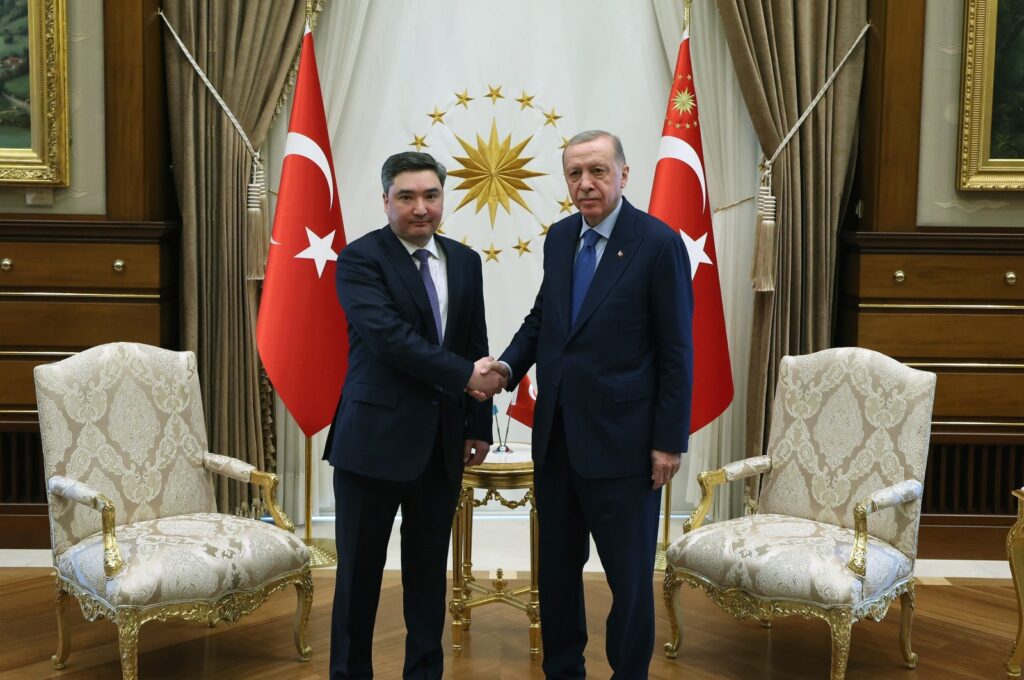 President Recep Tayyip Erdoğan and Kazakh Prime Minister Olzhas Bektenov shake hands in Türkiye's capital Ankara, April 25, 2024. (DHA Photo)