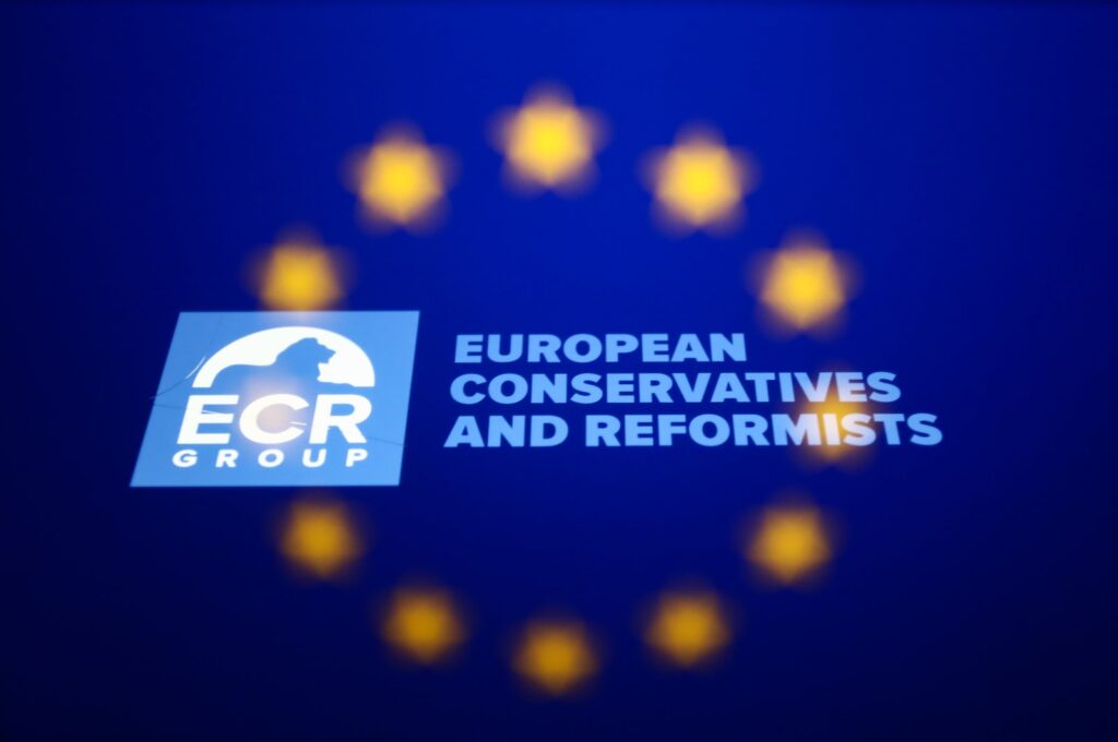 European Conservatives and Reformists Group logo displayed on a phone screen and European Union flag displayed on a laptop screen are seen in this multiple exposure illustration photo taken in Krakow, Poland on Aug. 25, 2022. (Reuters File Photo)