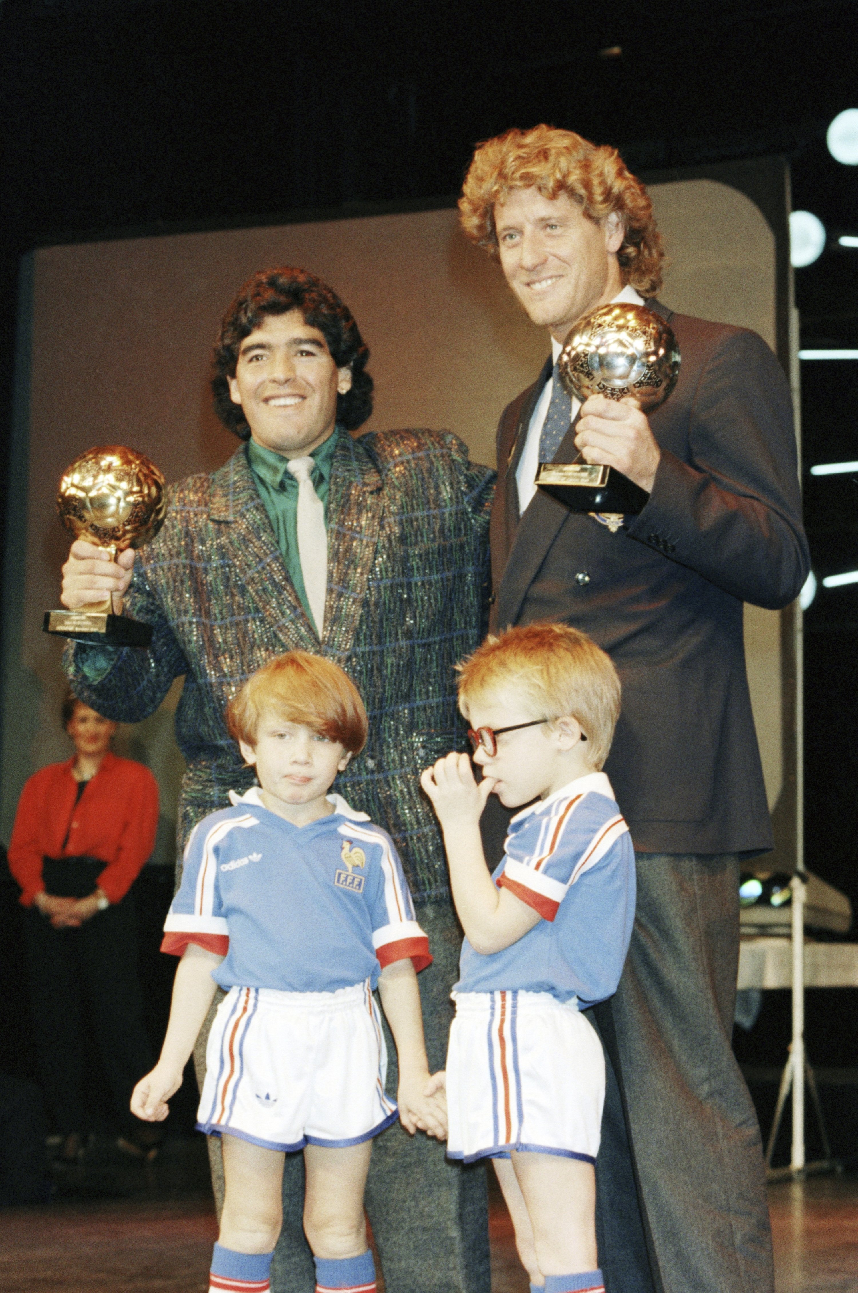 326917 Argentina's Diego Maradona (L) and German goalkeeper Harald Schumacher hold their World Cup awards during the Soccer Golden Shoe Award ceremony, Paris, France, Nov. 13, 1986. (AP Photo)