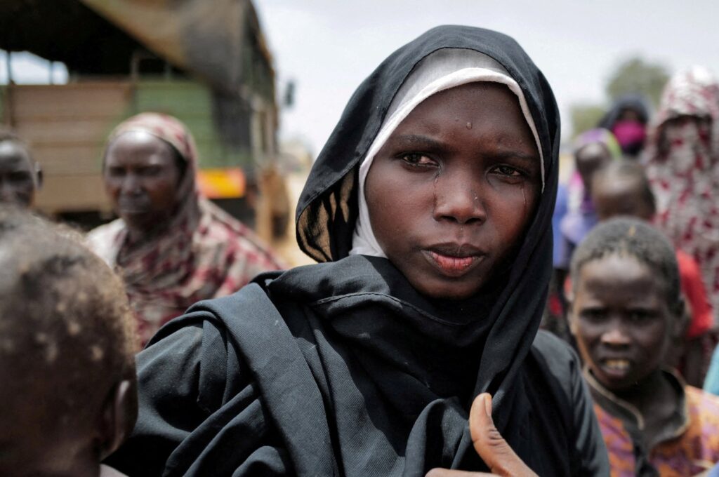 Amani Abdullah, 20, a Sudanese woman from el-Geneina in Sudan's Darfur region, mourns her husband, who was killed by the Rapid Support Forces (RSF), Adre, Chad July 25, 2023. (Reuters Photo)