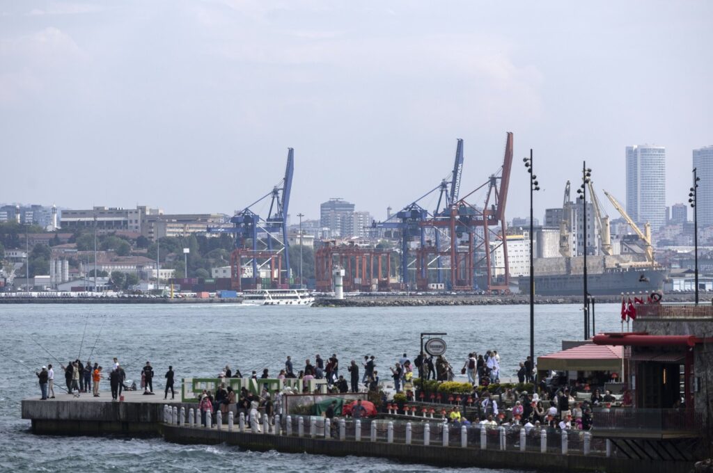 People stand on a pier near the Bosporus near Haydarpaşa Port, Istanbul, Türkiye, May 3, 2024. (EPA Photo)