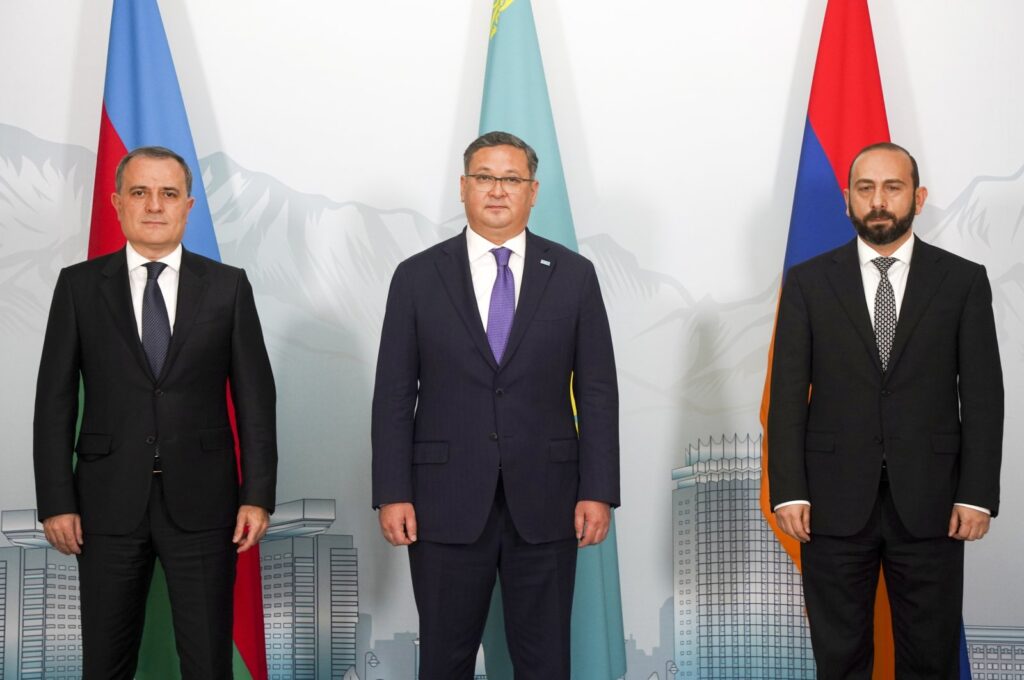 Azerbaijan's Foreign Minister Jeyhun Bayramov, left, Kazakhstan Foreign Minister Murat Nurtleu, center, and Armenian Foreign Minister Ararat Mirzoyan pose for a photo prior to their talks in Almaty, Kazakhstan, Friday, May 10, 2024. (Vladimir Tretyakov/NUR.KZ via AP)