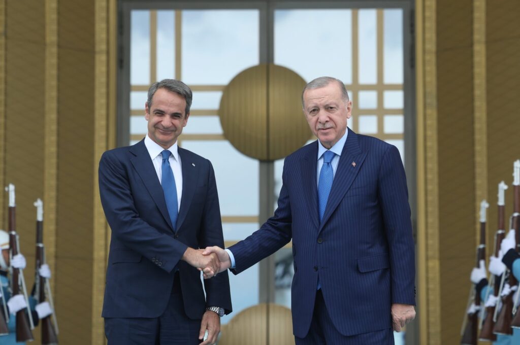 A handout photo made available by the Turkish President Press Office shows, President Recep Tayyip Erdoğan (R) and Greek Prime Minister Kyriakos Mitsotakis (L) posing for a photograph during a welcome ceremony before their meeting at the Presidential Complex in Ankara, May 13, 2024. (EPA Photo)