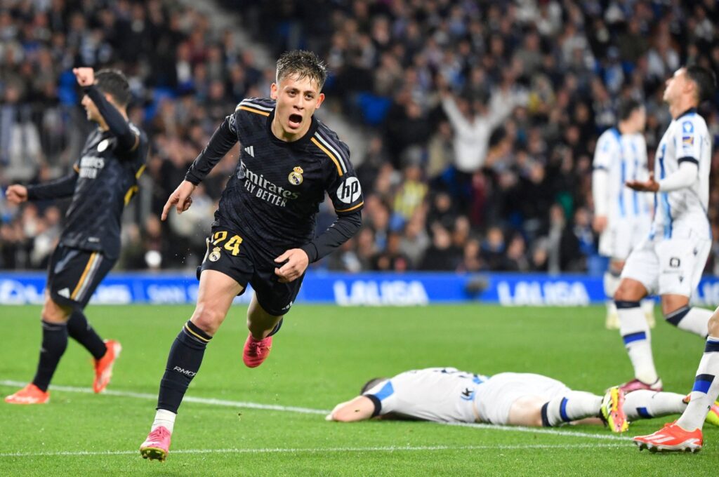 Real Madrid's Arda Güler celebrates scoring his team's first goal during the Spanish league football match against Real Sociedad, at the Anoeta stadium, San Sebastian, Spain, April 26, 2024. (AFP Photo)