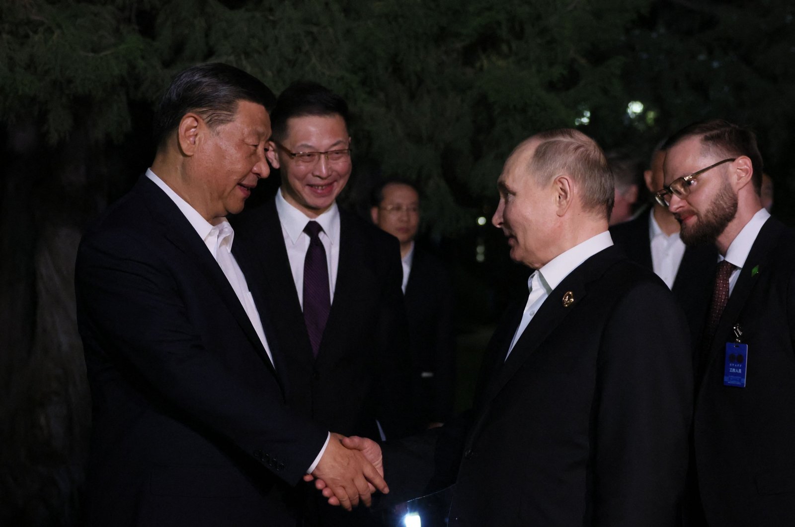 China's President Xi Jinping (L) and Russia's President Vladimir Putin shake hands after their talks, Beijing, China, May 16, 2024. (AFP Photo)