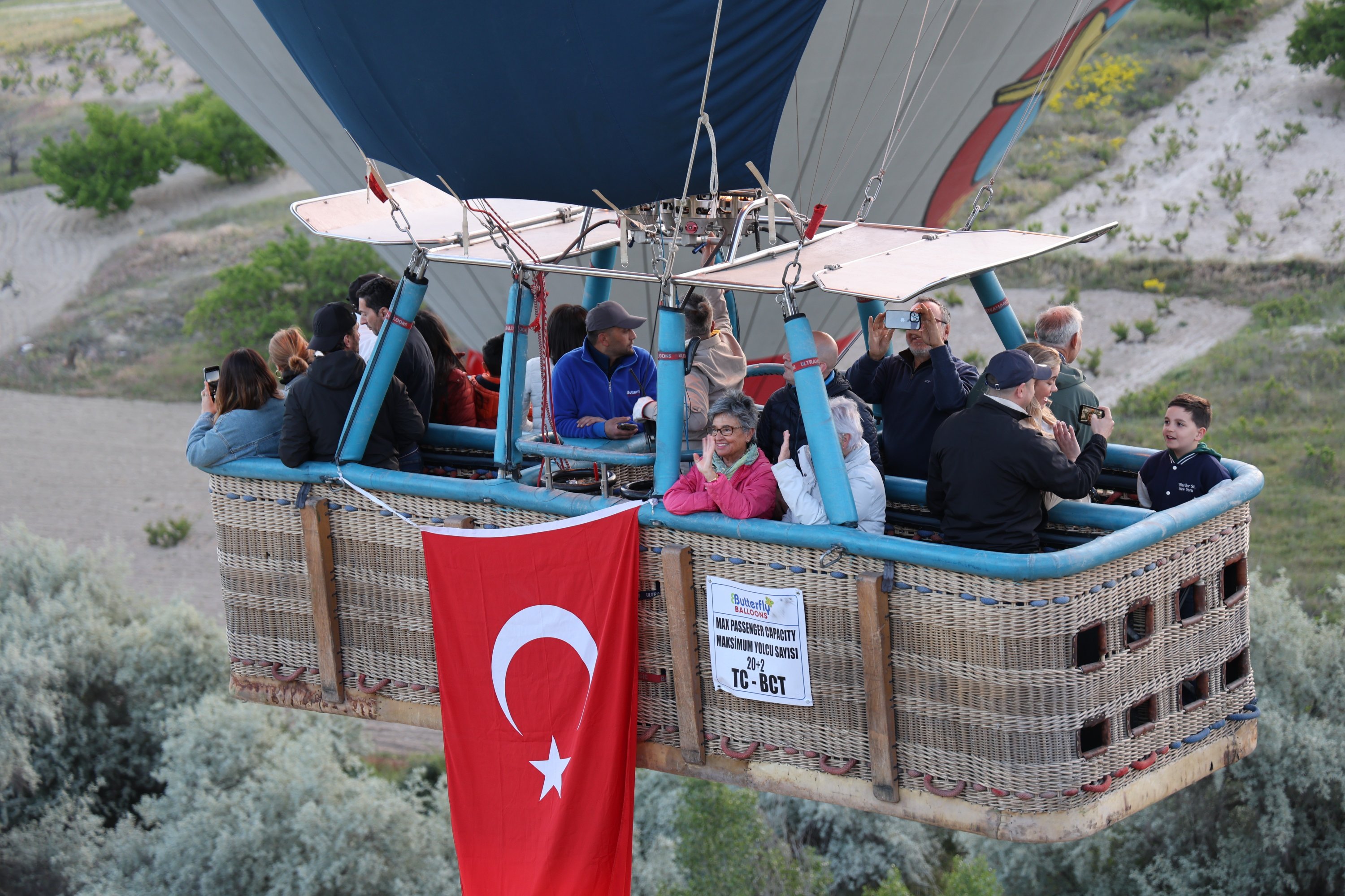 328531 In celebration of May 19th, people are aboard the balloons adorned with Turkish flag, Cappadocia, Nevşehir, Türkiye, May 19, 2024. (İHA Photo)