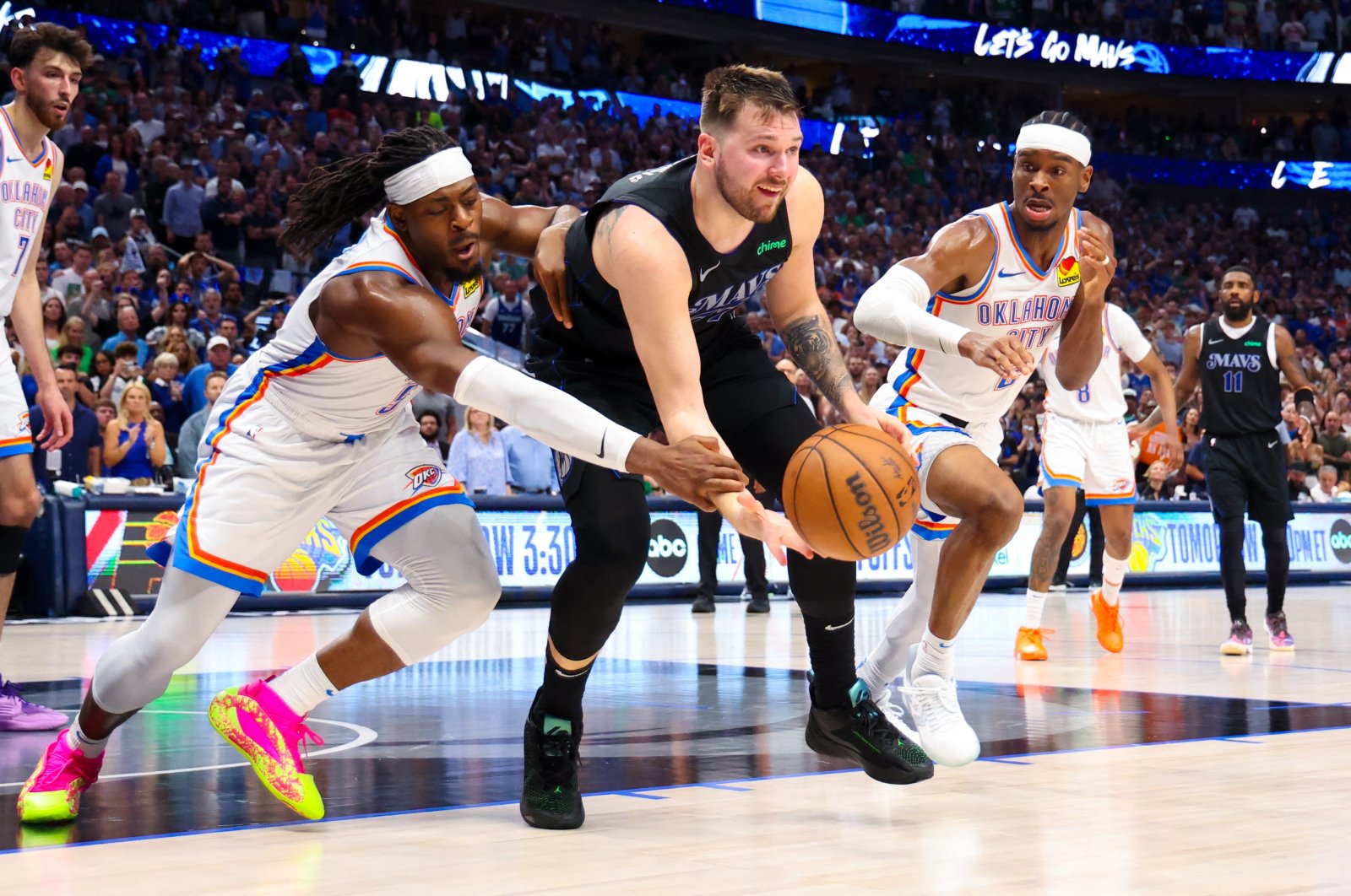 Dallas Mavericks guard Luka Doncic (C) passes the ball during the second half in game six of the second round of the 2024 NBA playoffs against Oklahoma City Thunder, American Airlines Center, Dallas, U.S., May 19, 2024. (Reuters Photo)