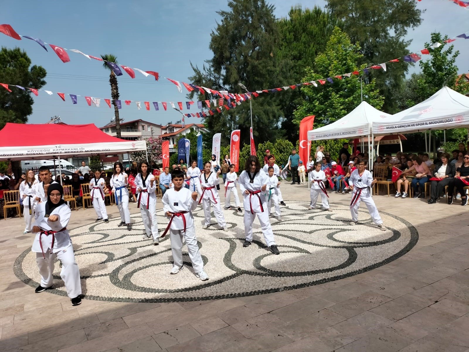 328568-1 Children perform karate demonstrations as part of the festivities Köyceğiz in Muğla, Türkiye, May 19, 2024. (IHA Photo)