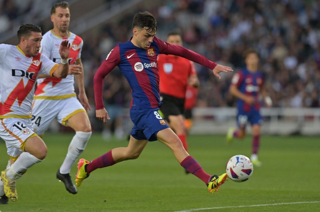 Barcelona's Pedri kicks the ball and scores his team's third goal during the La Liga match against Rayo Vallecano at the Estadi Olimpic Lluis Companys, Barcelona, Spain, May 19, 2024. (AFP Photo)