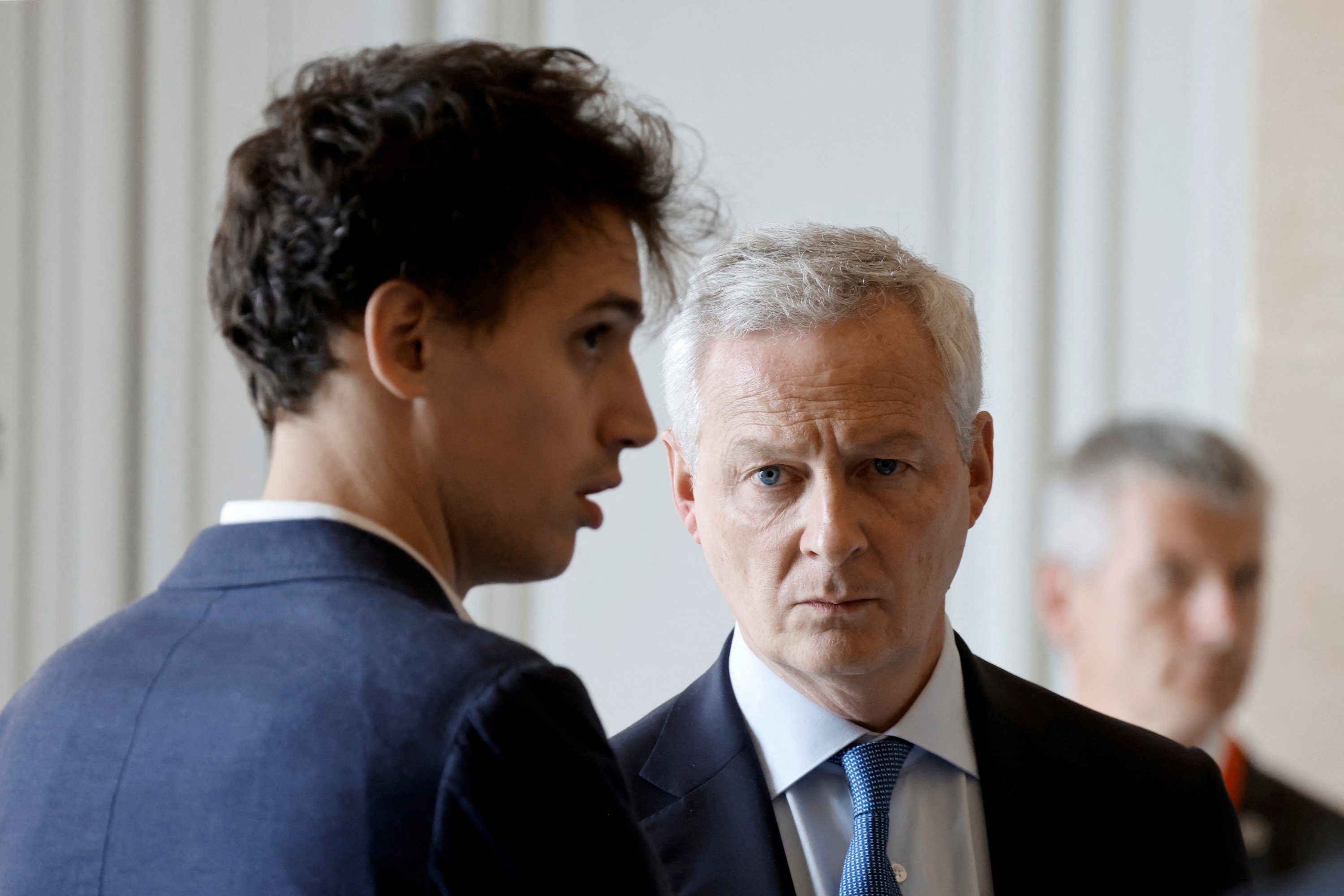 329086 French Economy Minister Bruno Le Maire (R) and founder of the Mistral AI startup Arthur Mensch (L) attend the 7th Choose France Summit, aiming to attract foreign investors to the country, at the Chateau de Versailles, outside Paris, France, May 13, 2024. (Reuters Photo)