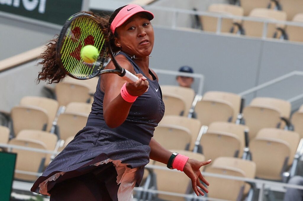 Japan's Naomi Osaka plays a forehand return to Italy's Lucia Bronzetti during their women's singles match on day one of The French Open tennis tournament on Court Philippe-Chatrier at the Roland Garros Complex, Paris, France, May 26, 2024. (AFP Photo)