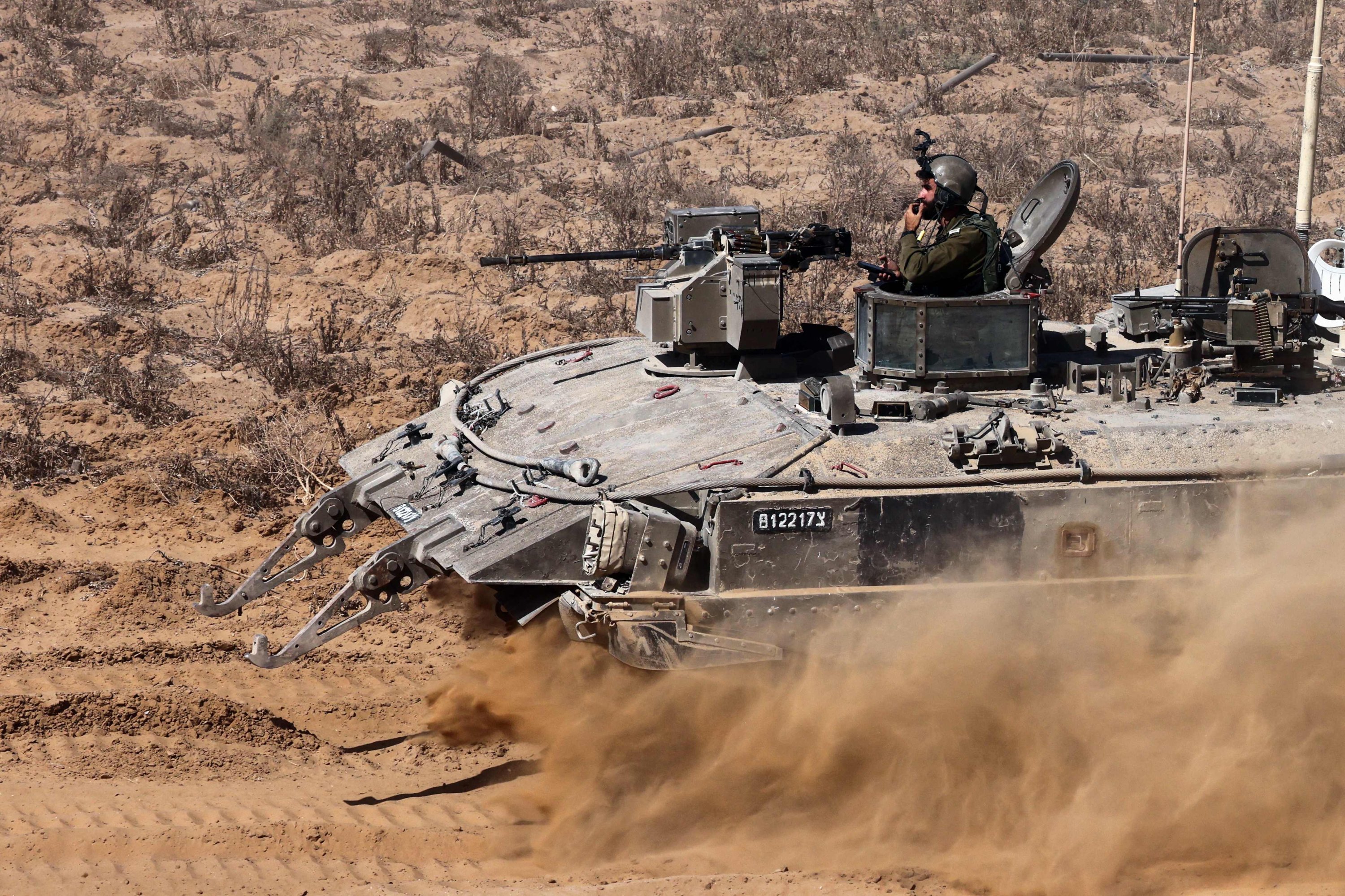 330579 Israeli soldiers man an armored vehicle operating near the border amid the ongoing Israeli strikes on Gaza, Gaza Strip, Palestine, May 30, 2024. (AFP Photo)
