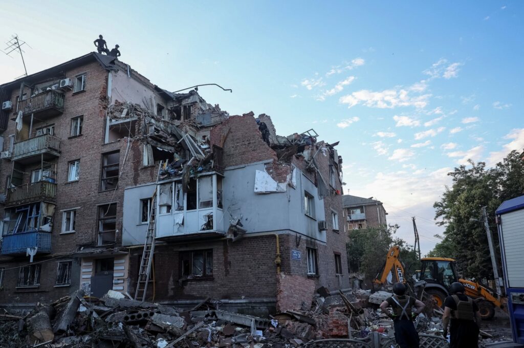 Rescuers work at a site of a residential building hit by a Russian missile strike, amid Russia's attack on Ukraine, in Kharkiv, Ukraine May 31, 2024. (Reuters Photo)
