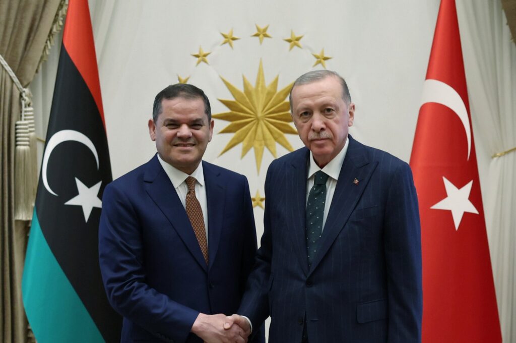 President Recep Tayyip Erdoğan and Libya's unity PM Abdul Hamid Dbeibah shake hands at the Presidential Complex in Ankara, May 31, 2024. (AA Photo)
