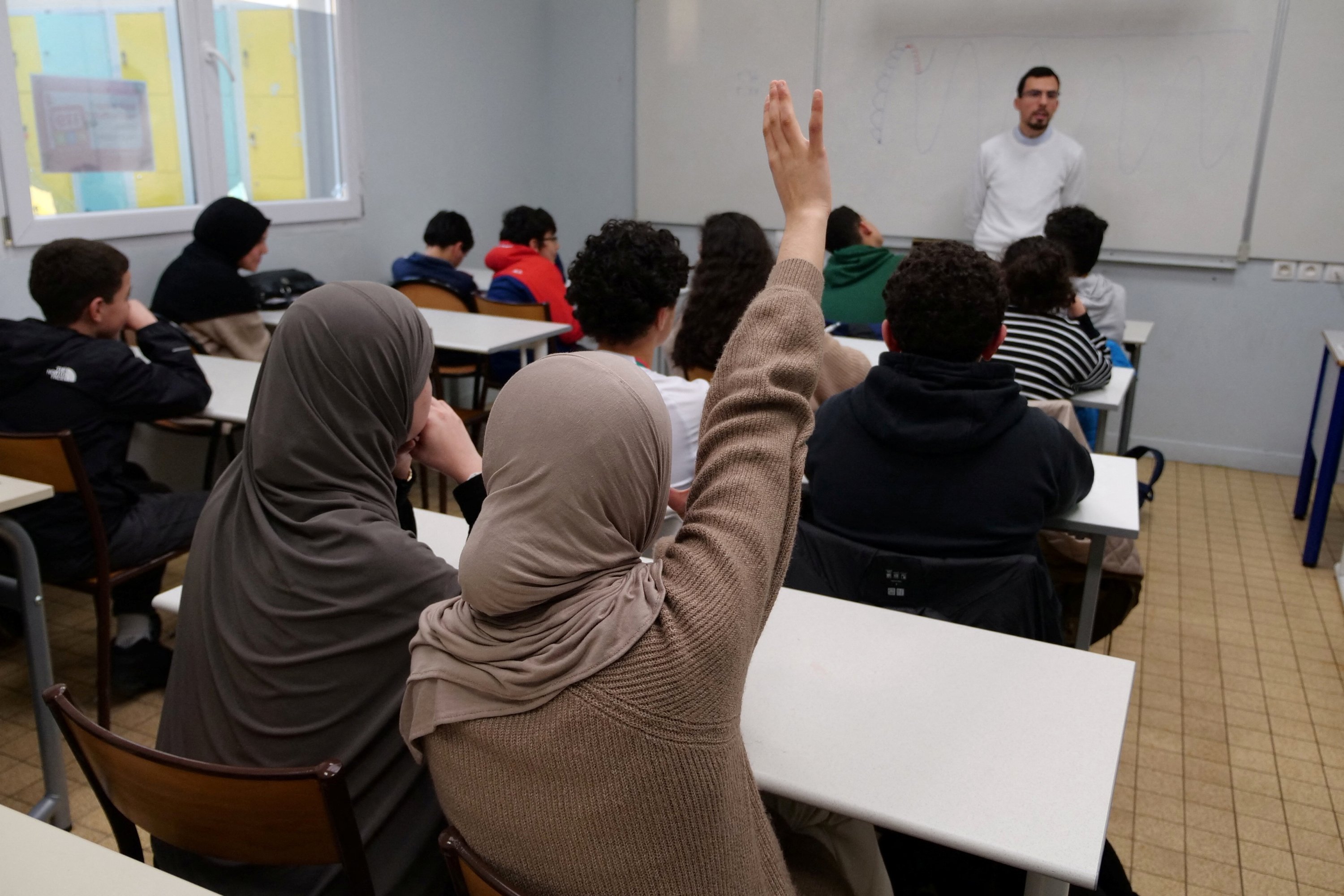 331050 Middle school students attend an Islamic ethics class at the Averroes school, in Lille, France, March 19, 2024. (Reuters Photo)
