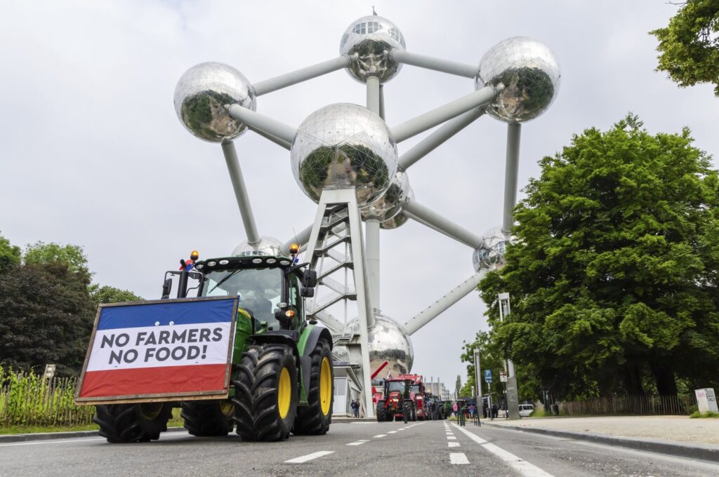 Farmers with their tractors gather around the Atomium, Brussels, Belgium, June 4, 2024.  (AP Photo)