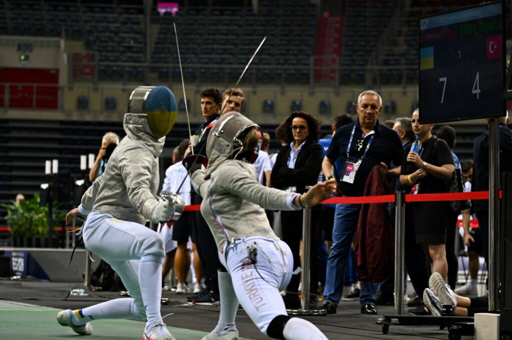 Türkiye's Nisanur Erbil (R) in action with Ukraine's Olga Kharlan during women's saber individual at Tauron Arena for the 3rd European Games, Krakow, Poland, June 27, 2023. (Getty Images Photo)