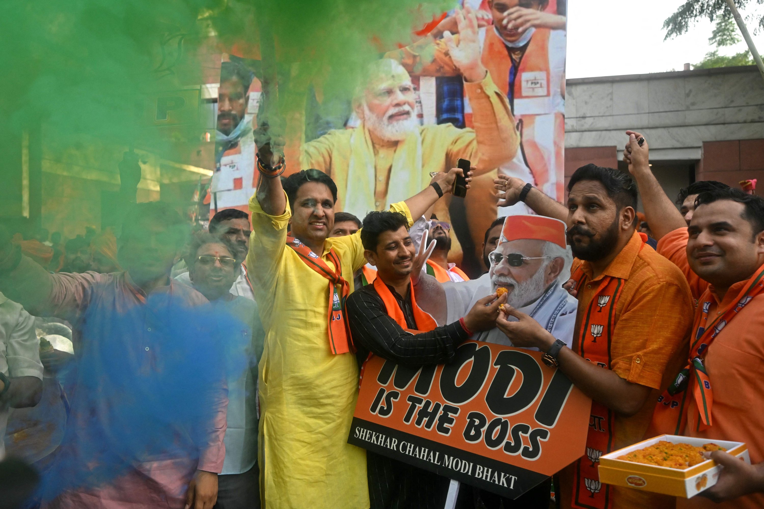 331168 Members of the Hindu nationalist Bharatiya Janata Party (BJP) celebrate vote counting results for India's general election, in New Delhi, India, June 4, 2024. (AFP Photo)