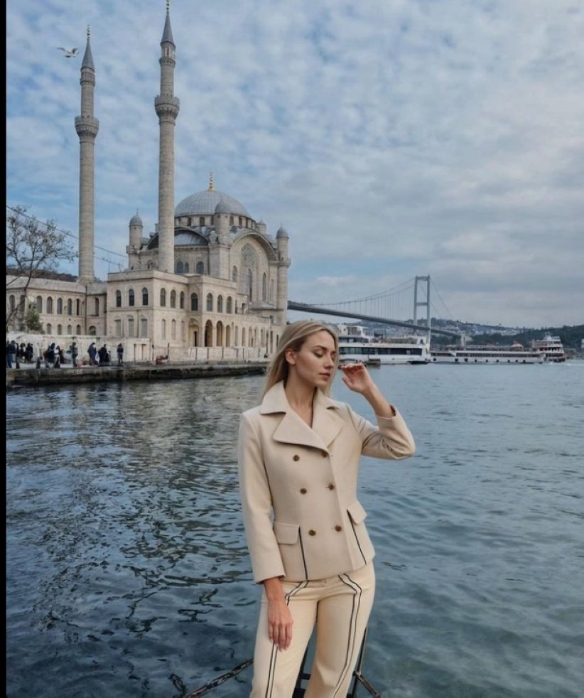Asena stands with the view of Ortaköy Mosque and the Bosphorus Bridge, Istanbul, Türkiye, May 31, 2024. (Instagram / @aisenailik)