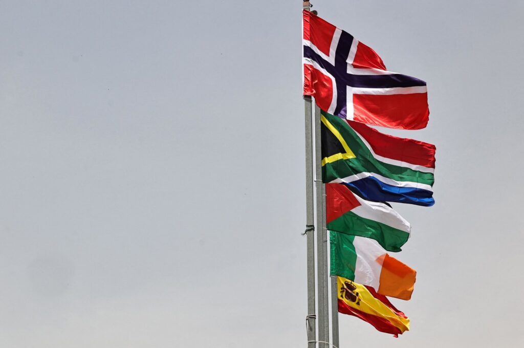 The flags of (from top) Norway, South Africa, Palestine, Ireland and Spain, are raised at an entrance of Ramallah city in the occupied West Bank, Palestine, May 28, 2024. (AFP Photo)