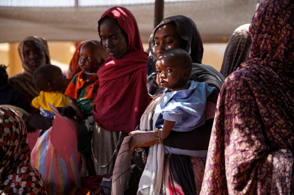 Women and babies at the Zamzam displacement camp, close to El Fasher in North Darfur, Sudan, January 2024. (Reuters Photo)