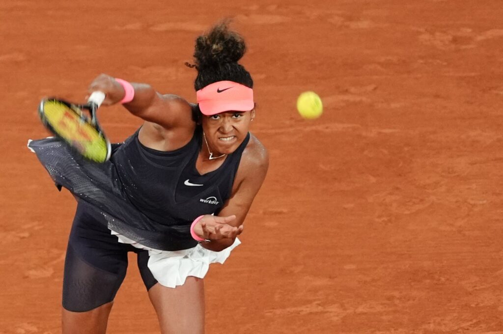 Japan's Naomi Osaka serves to Poland's Iga Swiatek during their women's singles match on Court Philippe-Chatrier on Day 4 of the French Open at the Roland Garros, Paris, France, May 29, 2024. (AFP Photo)