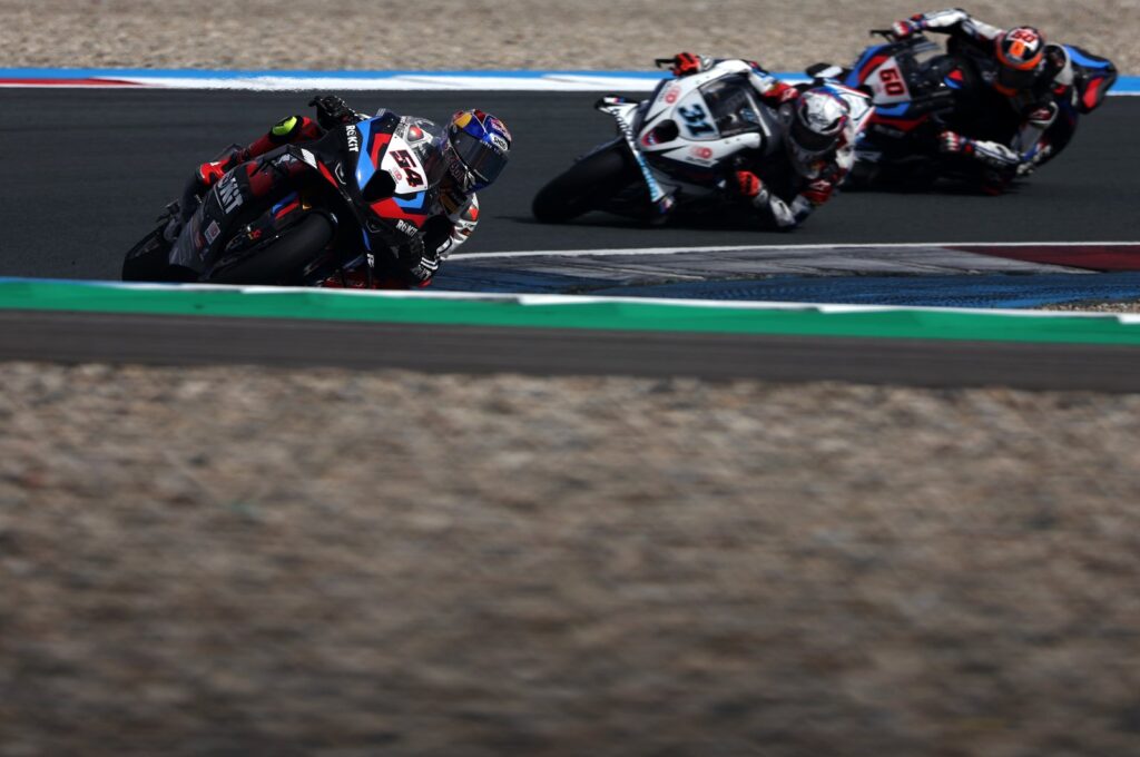 Türkiye's Toprak Razgatlıoğlu (L) riding a BMW M1000RR for team Germany ROKiT BMW Motorrad WorldSBK Team competes in the WorldSBK or Superbike World Championship, second practice session held at TT Circuit Assen, Assen, Netherlands, April 19, 2024. (Getty Images Photo)