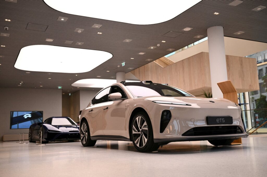 A NIO ET5 car model and the NIO EP9 sports car are pictured at the NIO House, the showroom of the Chinese premium smart electric vehicle manufacturer NIO Inc., Berlin, Germany, Aug. 17, 2023. (Reuters Photo)