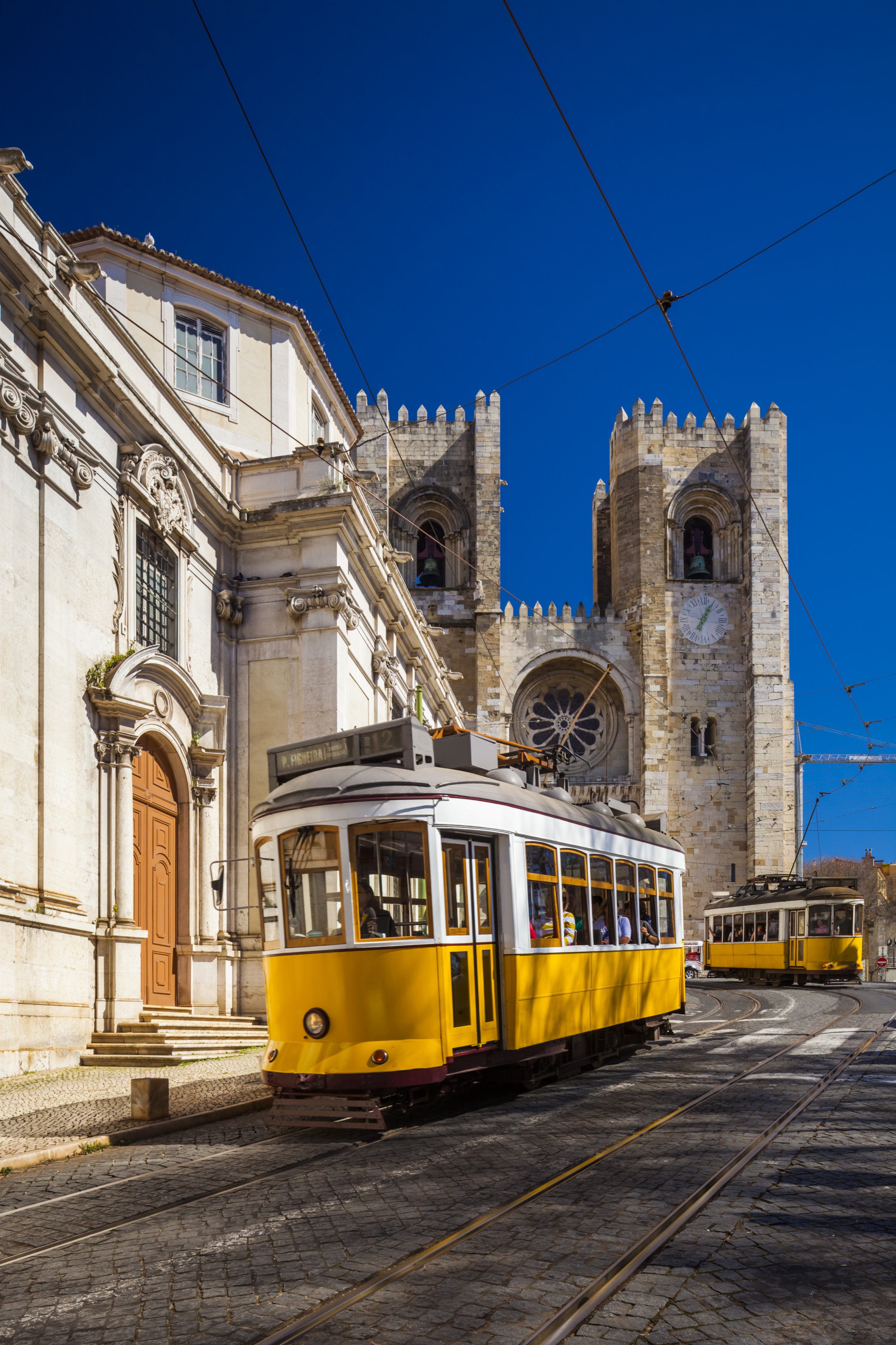 334177 Traditional trams in front of Lisbon Cathedral in the Alfama district, Lisbon, Portugal, March 8, 2017. (Getty Images)