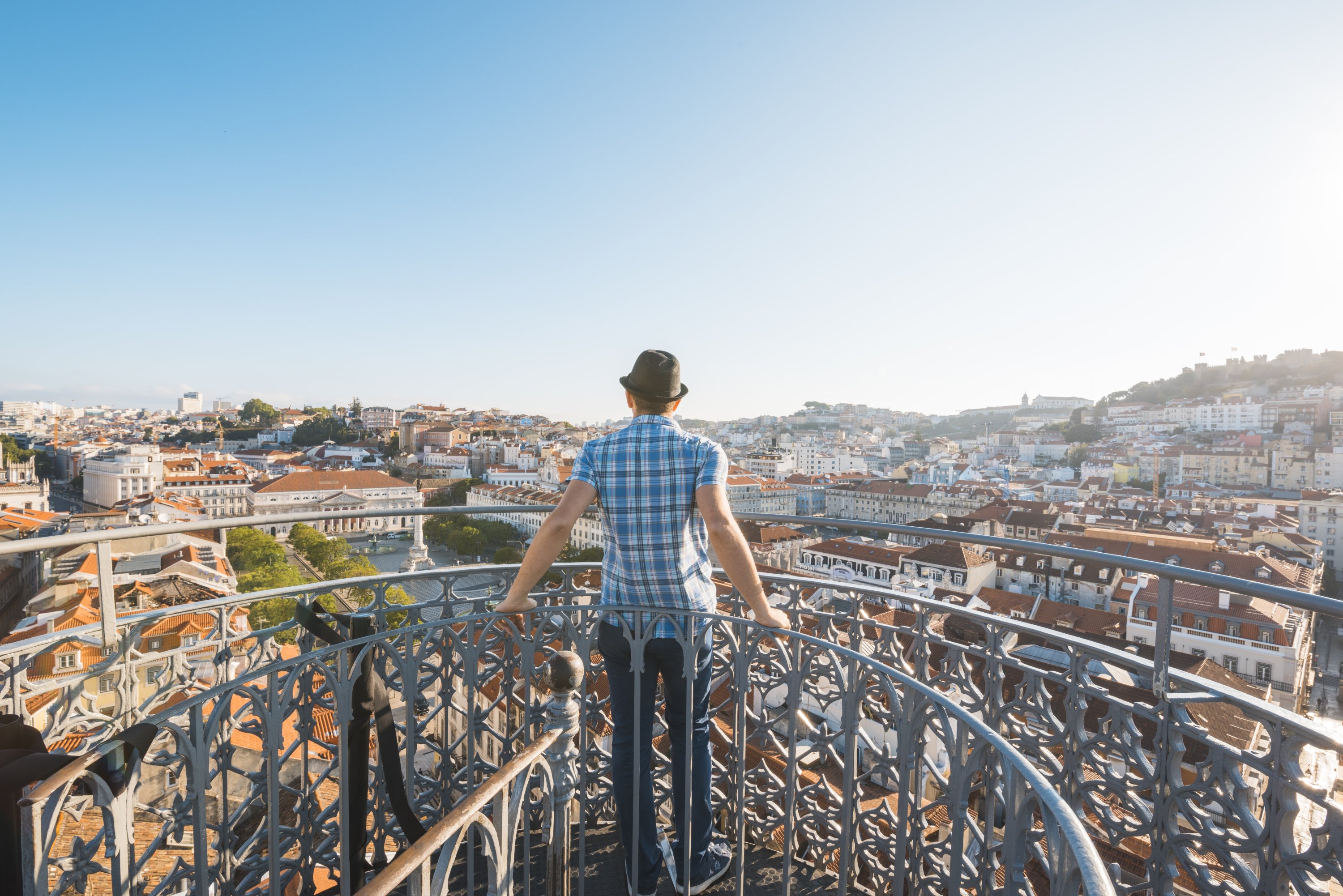 334203 A tourist admires the view from the Elevador de Santa Justa, Lisbon, Portugal, July 21, 2018. (Getty Images)