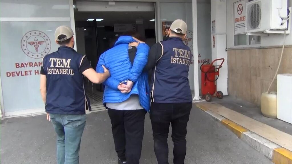 Police officers escort a Daesh suspect to a hospital for a medical checkup following his detention, Istanbul, Türkiye, July 3, 2024. (DHA Photo)