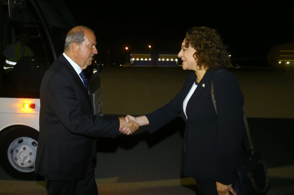 TRNC President Ersin Tatar (L) shakes hands with his country's representative in Baku, Ufuk Turganer (R), as he arrives at the Heydar Aliyev International Airport, Azerbaijan, July 4, 2024, (AA Photo)