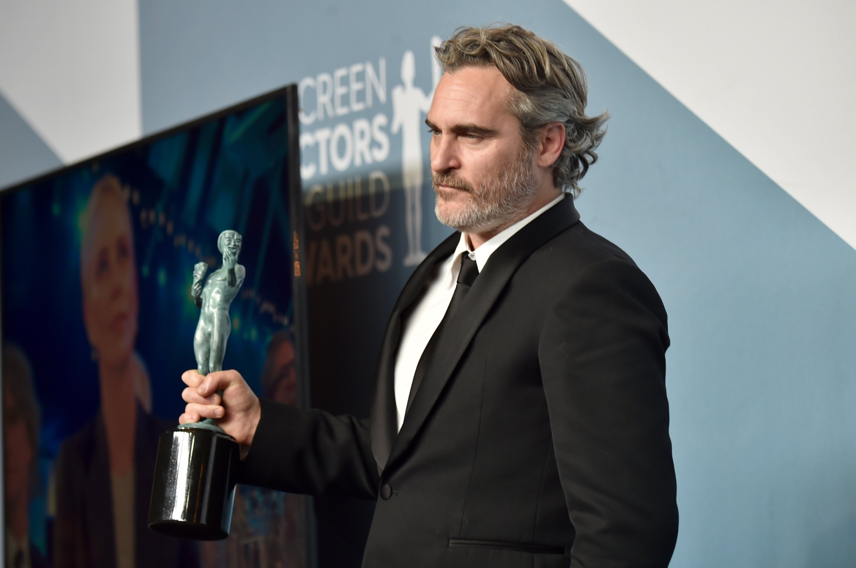 336043 Joaquin Phoenix poses in the press room after winning the award for Outstanding Performance by a Male Actor in a Leading Role for