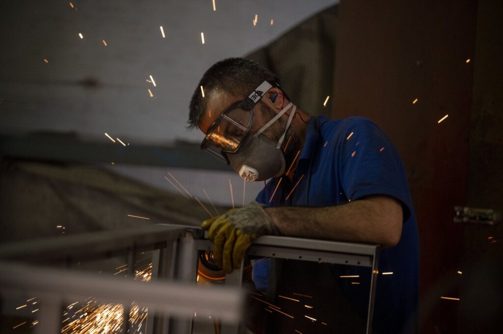 A worker is photographed in a factory producing furniture, Ankara, Türkiye, Aug. 31, 2023. (AA Photo)