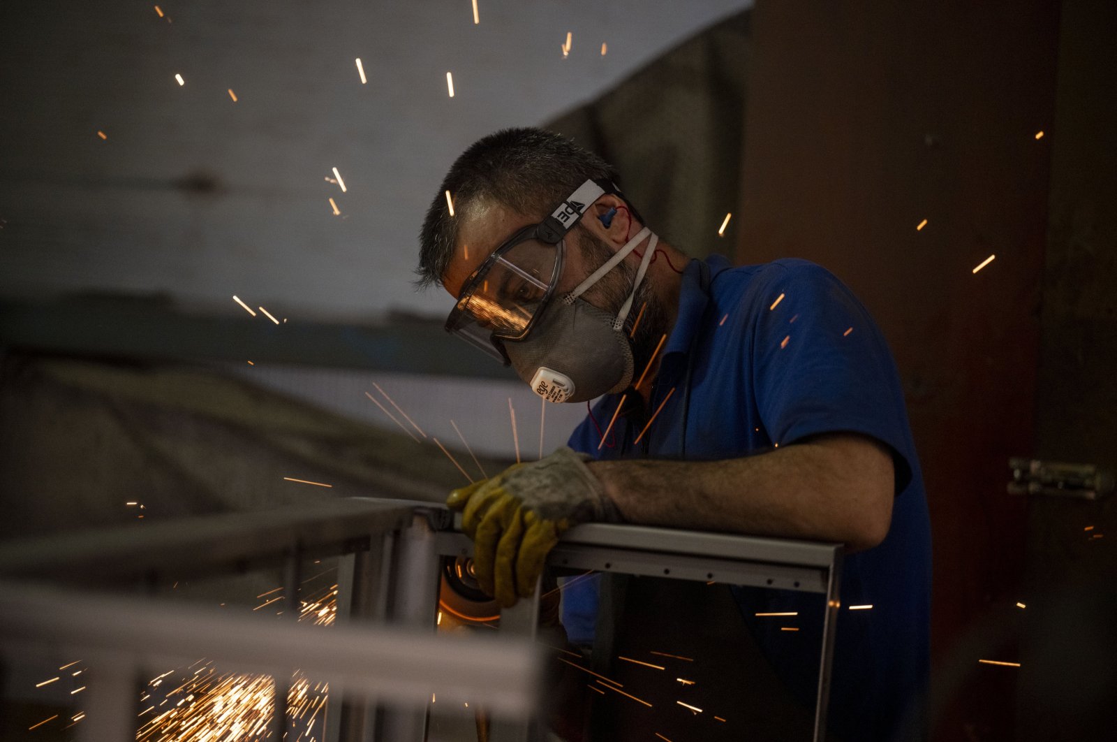 A worker is photographed in a factory producing furniture, Ankara, Türkiye, Aug. 31, 2023. (AA Photo)