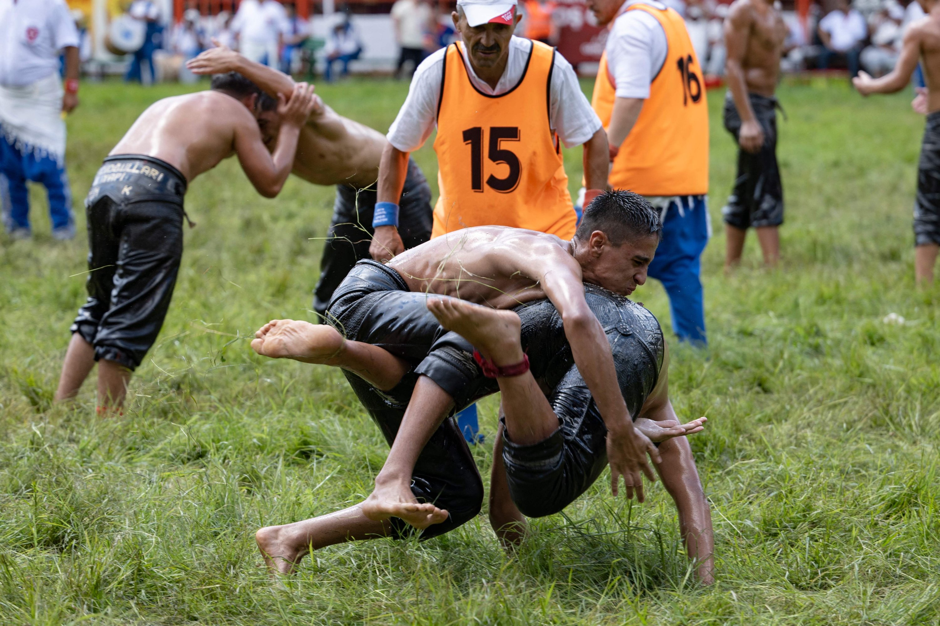 336325 Wrestlers compete during the 663rd edition of the annual Historic Kırkpınar Oil Wrestling championship, Edirne, Türkiye, July 7, 2024. (AFP Photo)