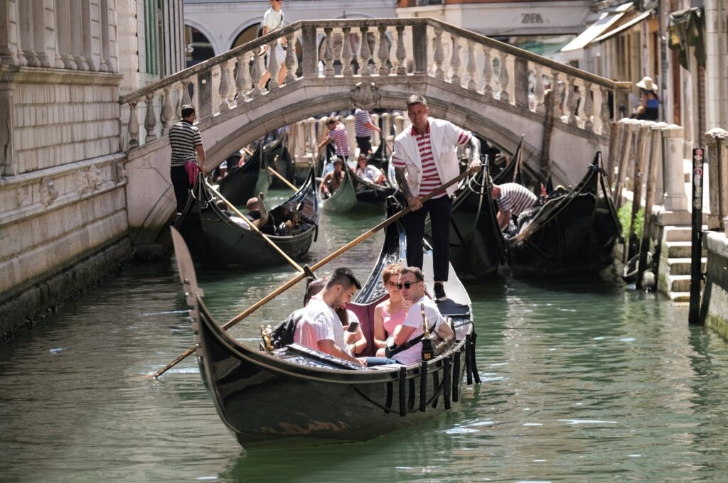 Day-trippers take a gondola tour, on the last day of the experimental 5 euro entry fee to visit Venice, Venice, Italy, July 14, 2024. (Reuters Photo)