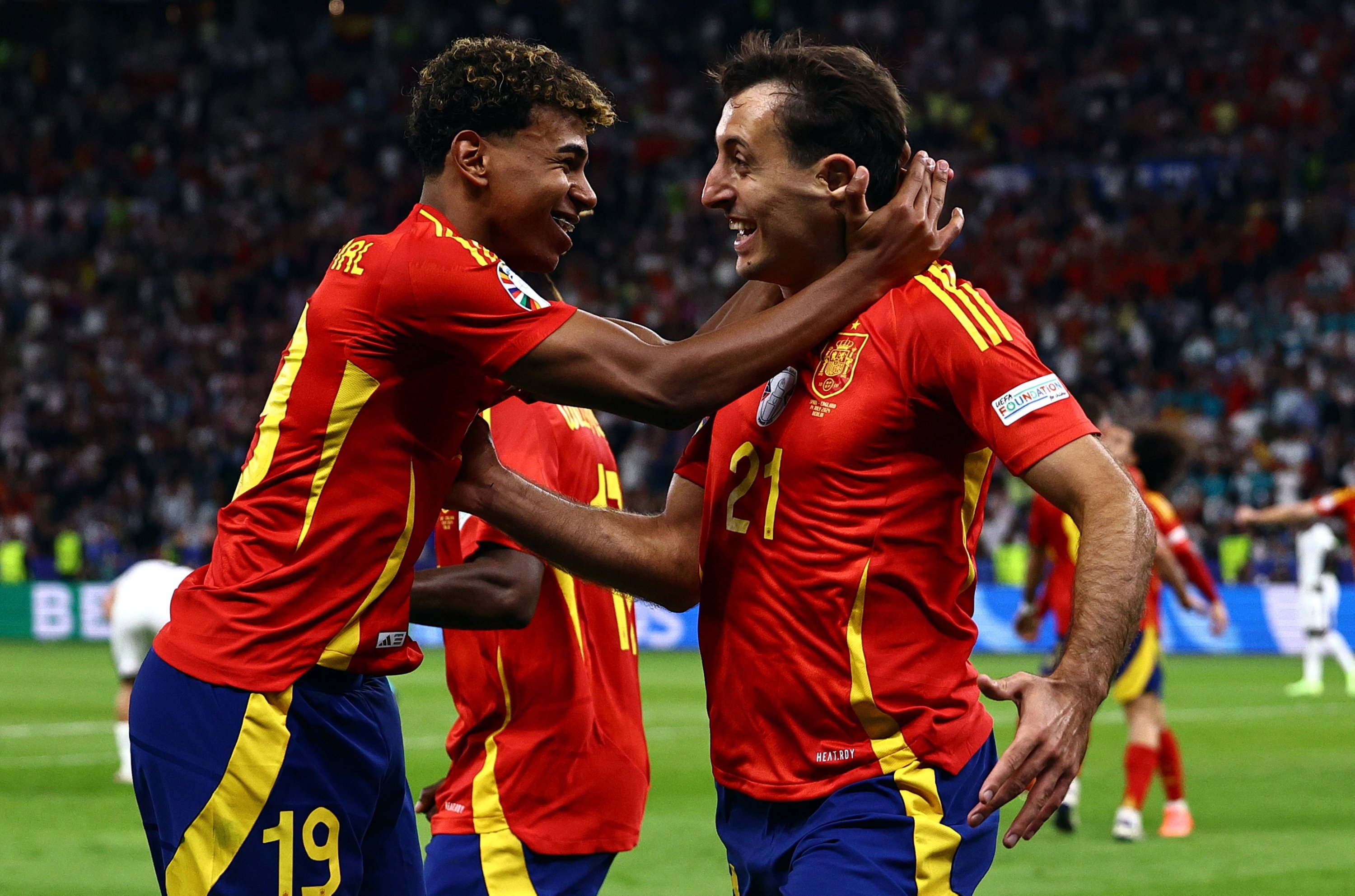 336764 Spain's Mikel Oyarzabal (R) celebrates scoring the 2-1 with Lamine Yamal during the UEFA Euro 2024 final match between Spain and England, Berlin, Germany, July 14, 2024. (EPA Photo)