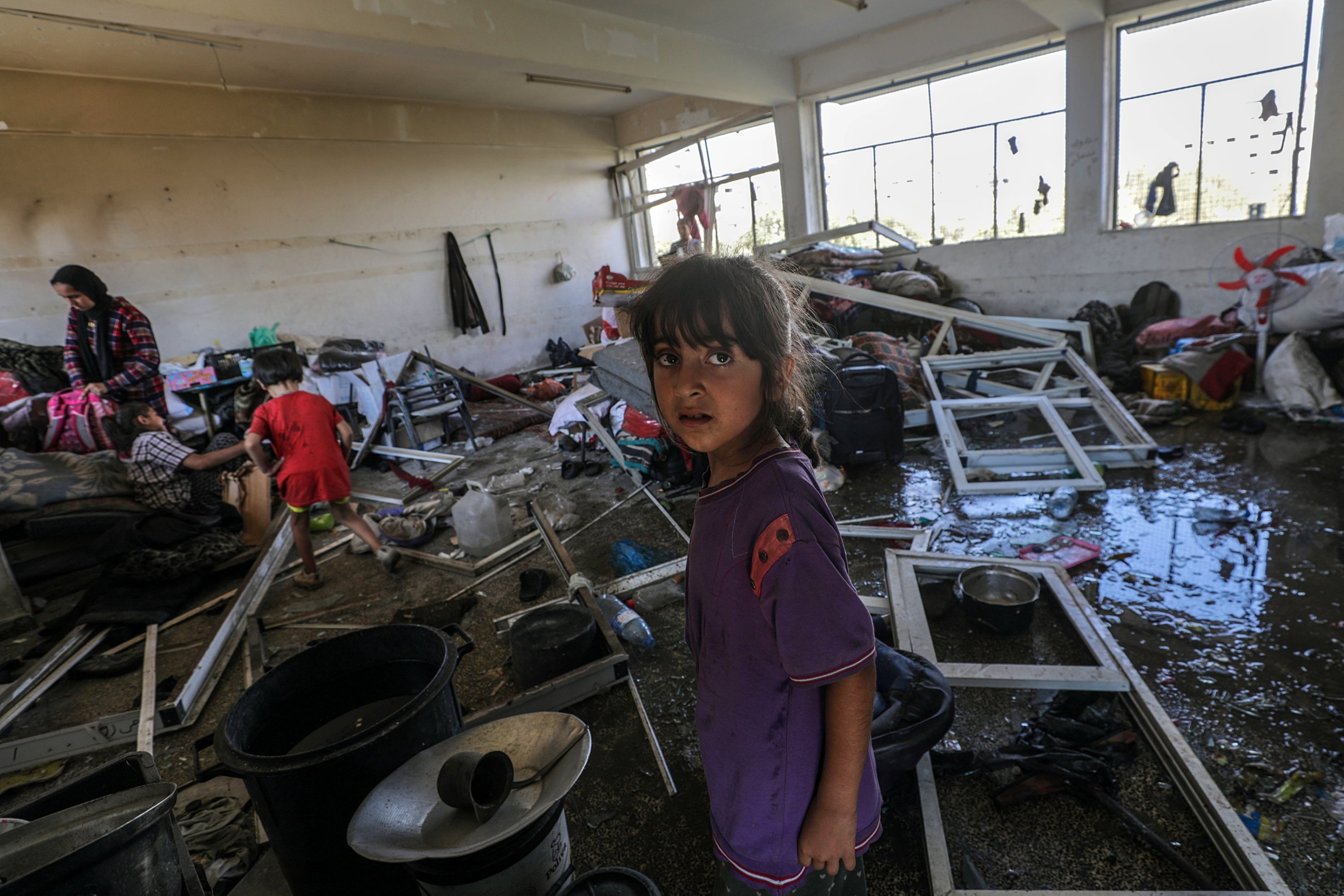 336889 A Palestinian girl inspects a damaged UNRWA school following an Israeli airstrike in al-Nuseirat refugee camp, Gaza Strip, Palestine, July 14, 2024. (EPA Photo)