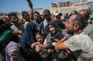 A Palestinian family mourns after their relative was killed following an Israeli airstrike in the al-Mawasi area of Khan Younis, Gaza Strip, Palestine, July 13, 2024. (EPA Photo)