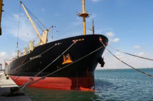 Greek-flagged bulk cargo vessel Sea Champion is docked to the port of Aden, Yemen to which it arrived after being attacked in the Red Sea in what appears to have been a mistaken missile strike by Houthi rebels, Feb. 21, 2024. (Reuters Photo)